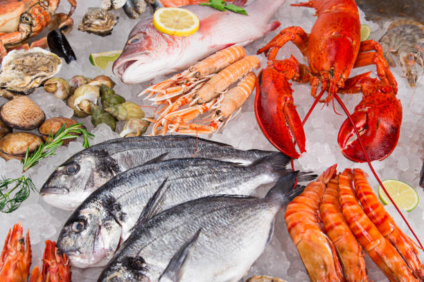 istock Fresh tasty seafood served on old wooden table 921680774