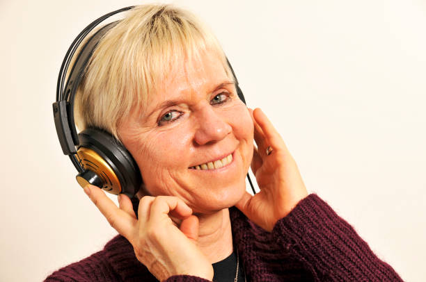 istock smiling woman with headphones 92168119