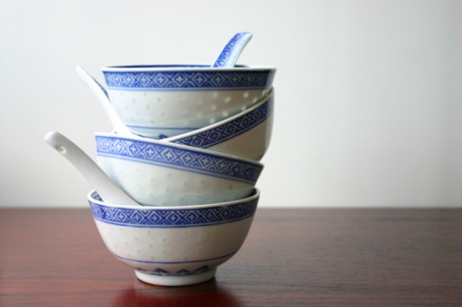 A closeup of colorful handmade ceramic pots for sale