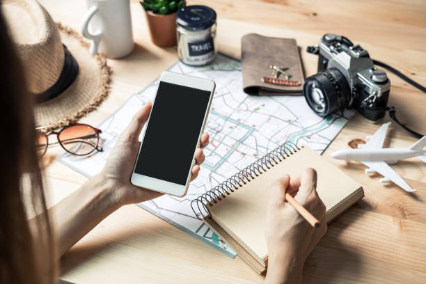 istock Young women traveler planning vacation trip 921685164