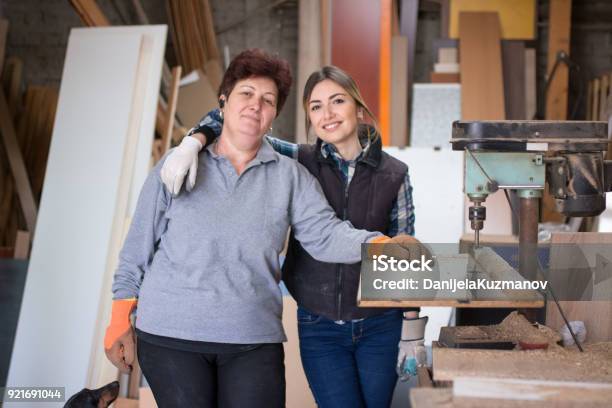 Mother And Daughter At Woodworking Workshop Stock Photo - Download Image Now - Mother, Daughter, Entrepreneur