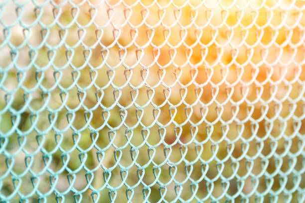 istock Green fence, side view. Green Background 921691678