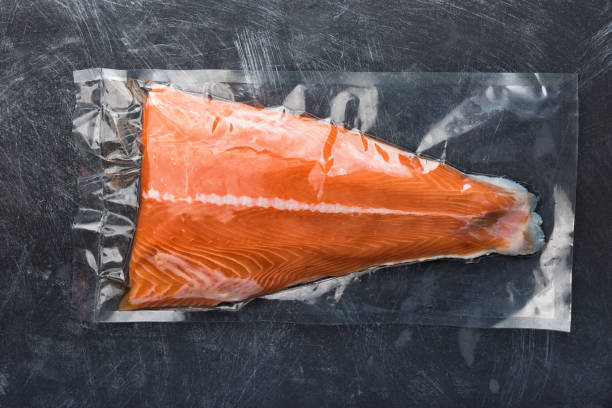 Salmon fillet packaged in plastic vacuum pack.