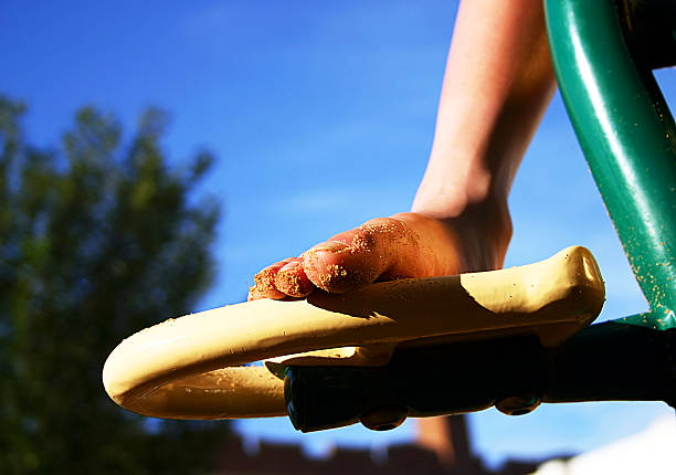 Sandy foot on ladder stock photo