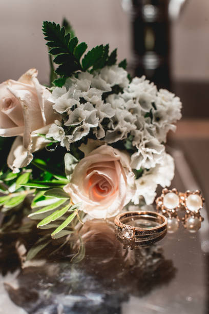 istock luxury wedding golden ring on the glass 921702828