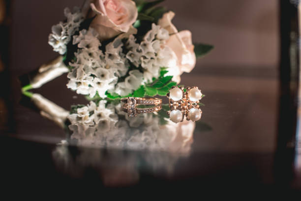 istock luxury wedding golden ring on the glass 921703020