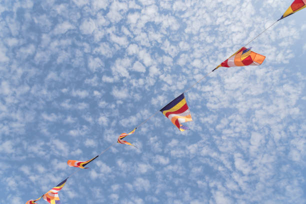 istock Colorful Buddhist prayer flags against Altocumulus cloud sky 921703384