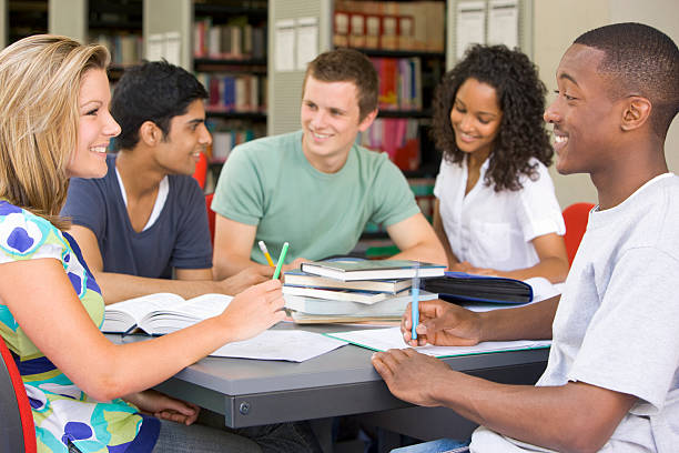 istock A group of college students studying at the library 92170640