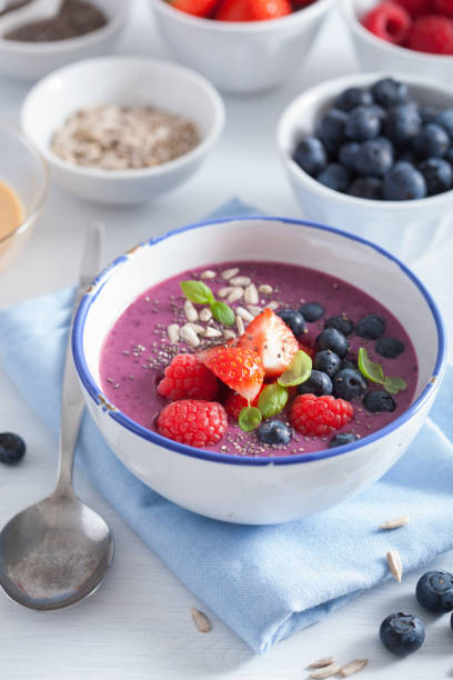 istock healthy berry smoothie bowl with strawberry blueberry raspberry and chia seed 921707670