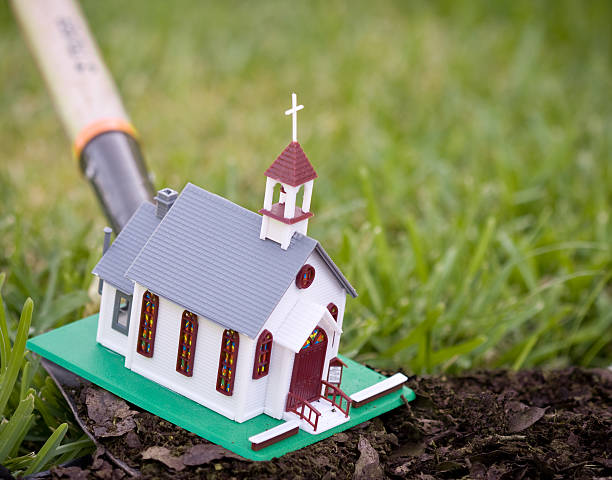 Concept of sowing or planting a new christian church on soil. 
