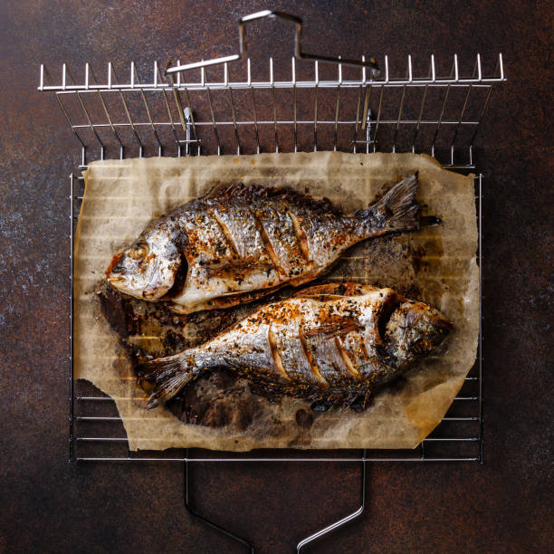 istock Grilled Fish Dorado on grill 921714056