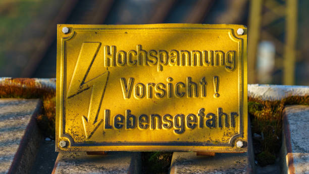 istock Sign: Hochspannung, Vorsicht! Lebensgefahr (German for: High voltage, caution! Risk of death) 921714858