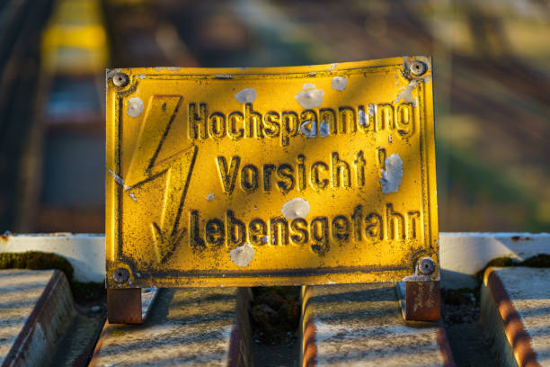 istock Sign: Hochspannung, Vorsicht! Lebensgefahr (German for: High voltage, caution! Risk of death) 921714884