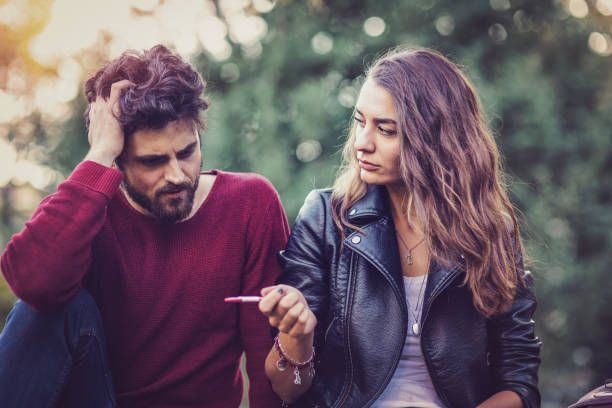 istock Young couple being unhappy with the pregnancy test result 921714916