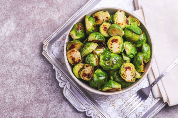 istock Vegetarian cuisine. Brussels Sprouts roasted with olive oil. Copyspace 921715634