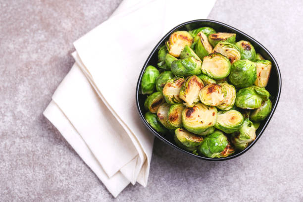 istock Vegetarian cuisine. Brussels Sprouts roasted with olive oil. Copyspace 921715720