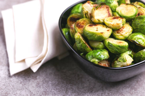 istock Vegetarian cuisine. Brussels Sprouts roasted with olive oil. Copyspace 921715770