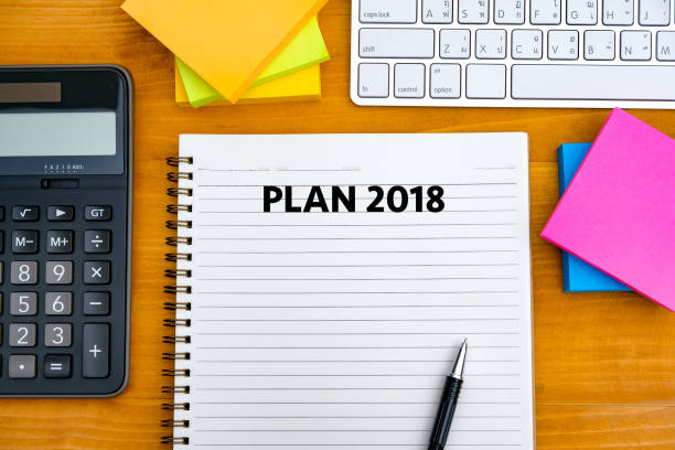 istock Plan 2018 Notebook business team meeting  with an Plan 2018 921720500