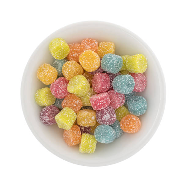 istock Sugar coated gummy candy pieces in a bowl 921720920