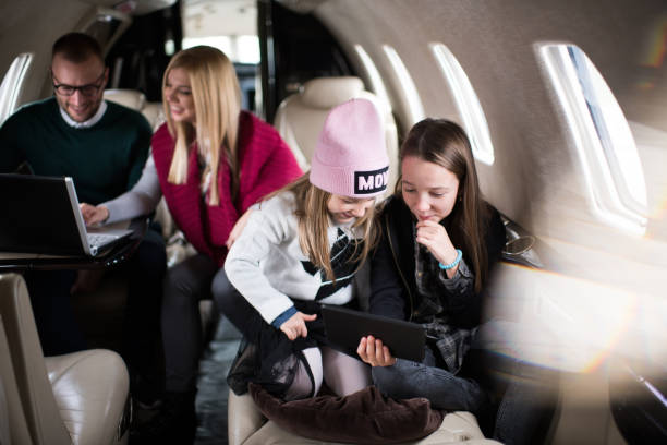 istock Family in the airplane 921725110