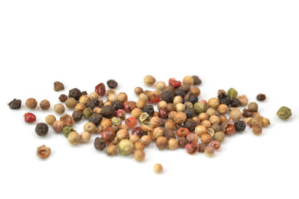 istock Peppercorn close up on white background 921726706
