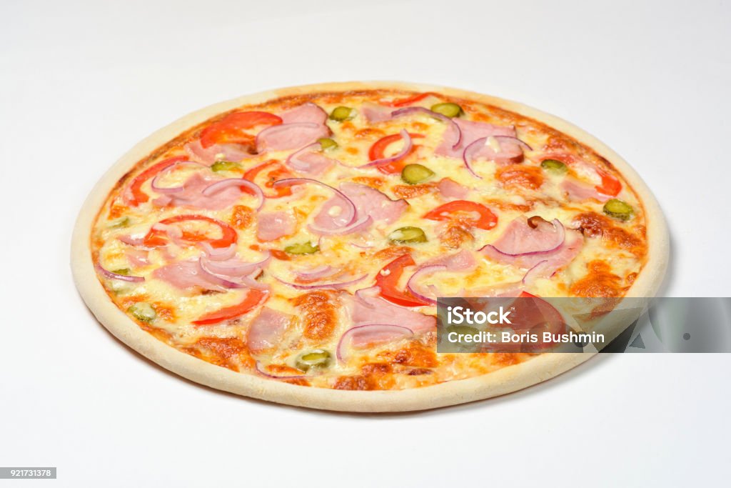 Pizza with gherkins, cheese and carbonate on a white background Pizza with gherkins, cheese and carbonate. White background Backgrounds Stock Photo Pizza with gherkins, cheese and carbonate on a white background Pizza with gherkins, cheese and carbonate. White background Backgrounds Stock Photo