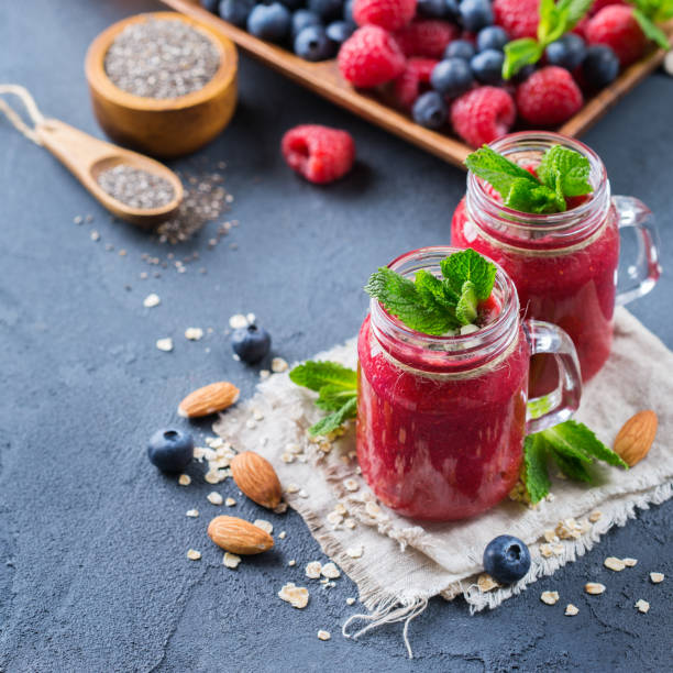 istock Healthy mixed smoothie for breakfast with berries, blueberry, raspberry 921737442