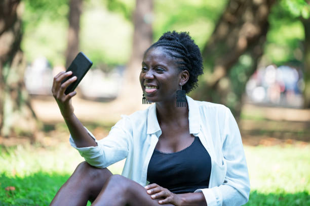 istock Black Woman Taking a Mean Selfie 921749680