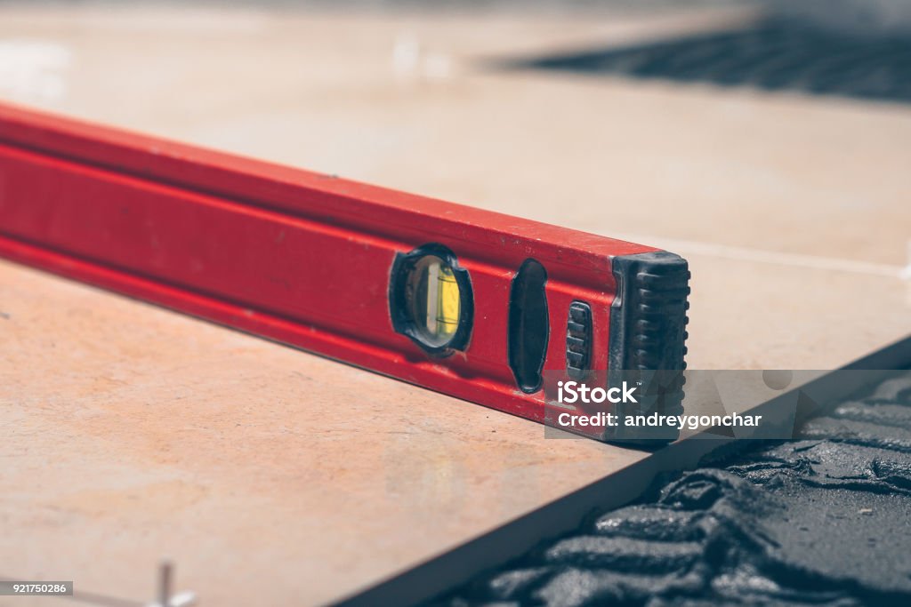 Building Level On Floor Tiles Measuring Tools Highly Skilled Work Stock ...