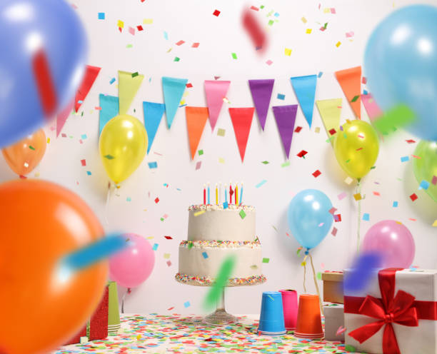 istock Birthday cake with burning candles 921751432