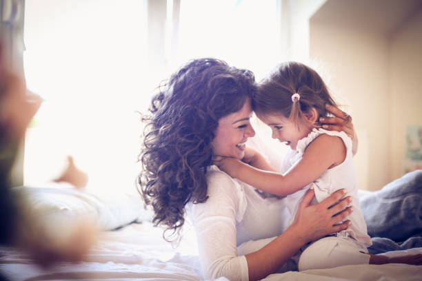 istock Happy single mother spending time with her little girl. 921751444