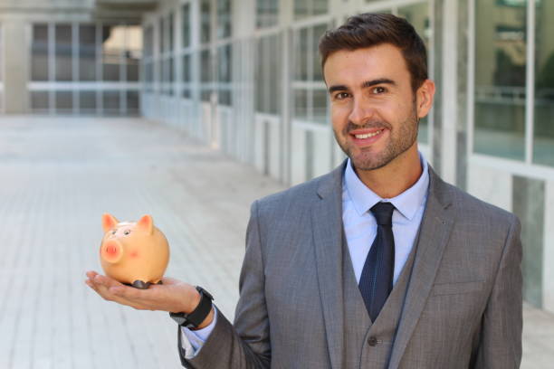 istock Proud entrepreneur holding his wealth 921752346