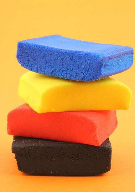istock pile of colorful plasticine blocks on orange background 92175449