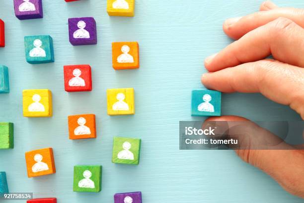 Image Of Colorful Blocks With People Icons Over Wooden Table Human Resources And Management Concept Stock Photo - Download Image Now