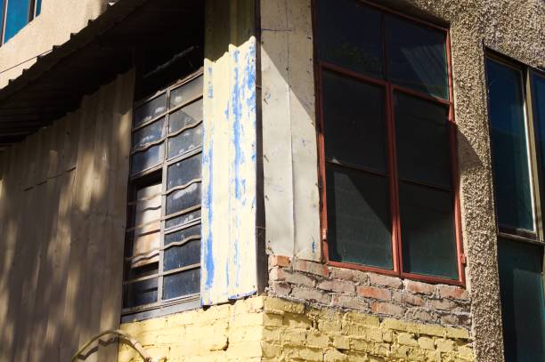 istock Colored windows of an abandoned house (Yuanyang, Yunnan, China) 921759008