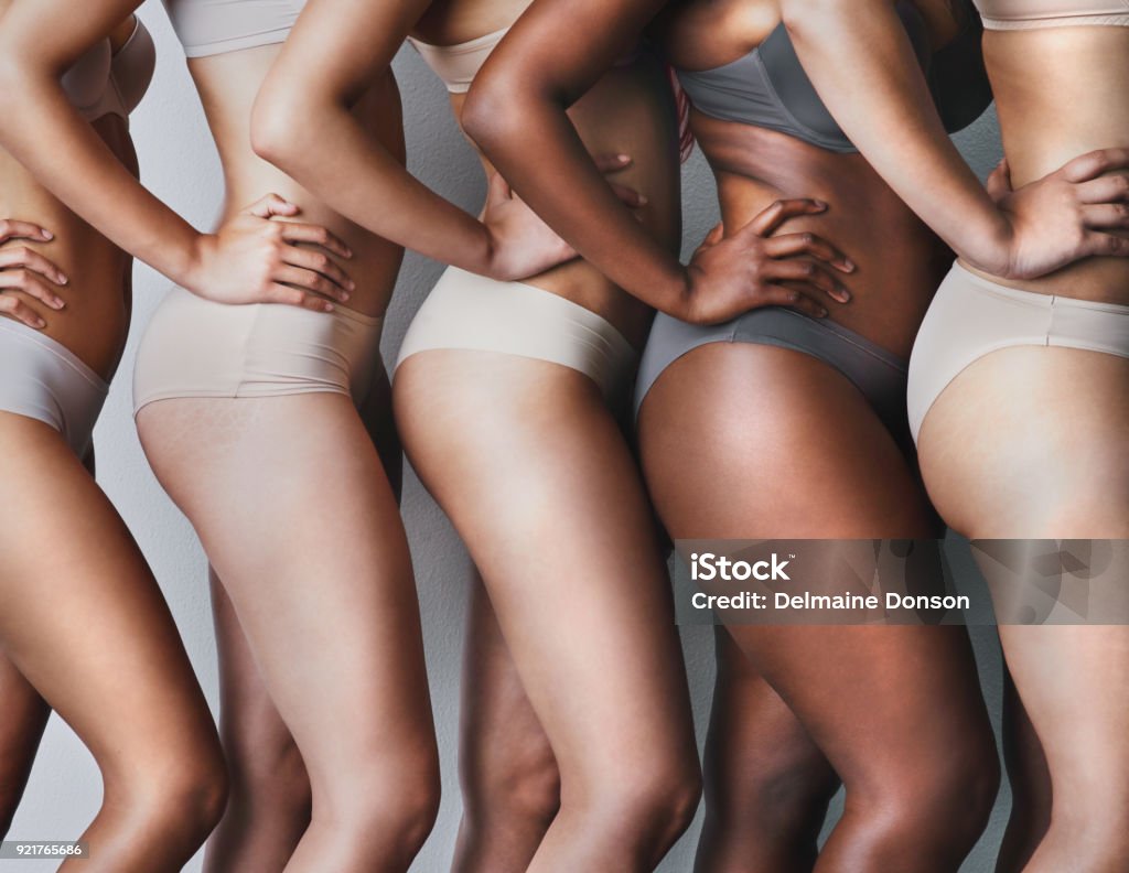Love your skin, its the house you live in Studio shot of unrecognizable women posing against a grey background The Human Body Stock Photo