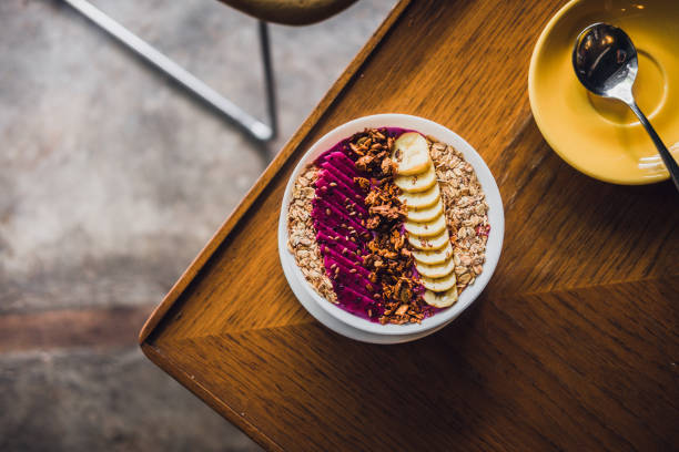istock Superfood smoothie bowl on a wooden table 921766026