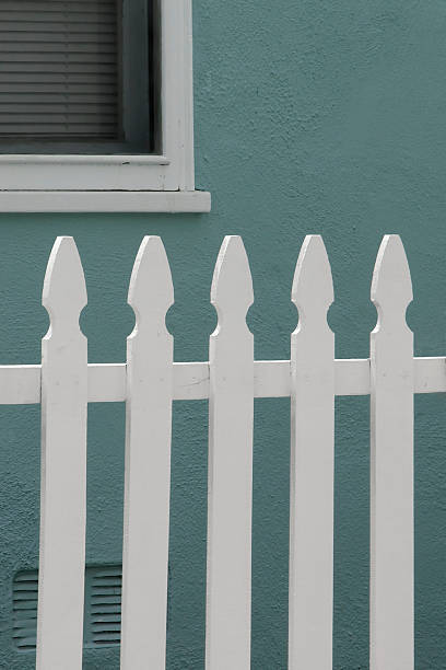 istock White Picket Fence Sage Green Wall 92177243
