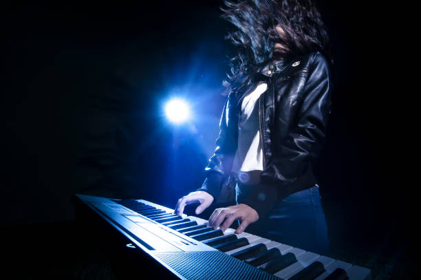 concept of musician on stage playng keybord