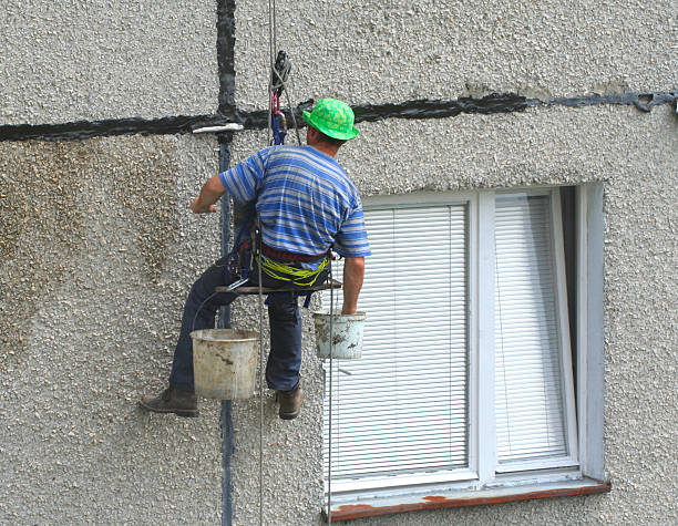 istock renovation worker on a block of flats #2 92178039
