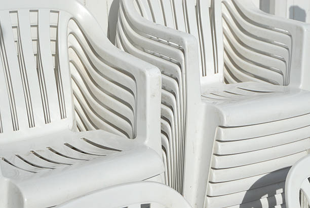 White plastic chairs stock photo