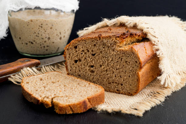 istock Homemade rye bread sliced. on black background. 921789026