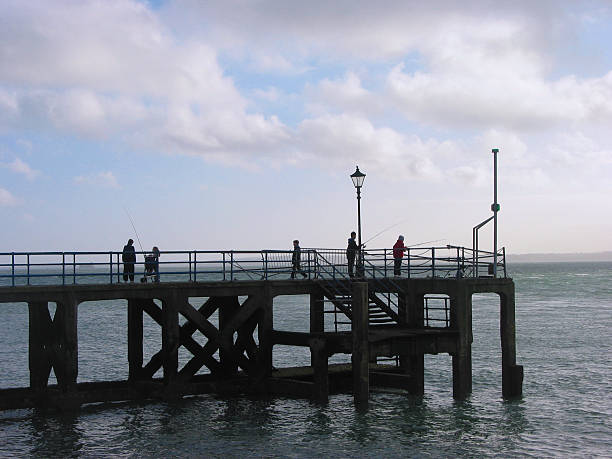istock Fishing off the pier 92178922