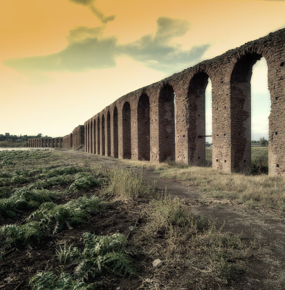 Roma, Italy - August 24, 2015: Acqueduct of Villa dei Quintili. It originated from the river Anio Novus to supply water for Villa, garden and fountains.