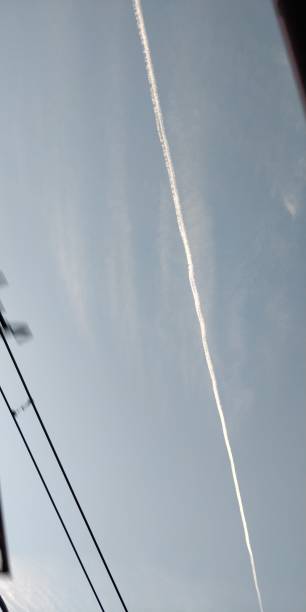 istock Airplane vapor trails 921803718