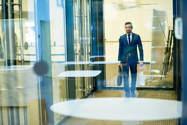 Handsome Businessman Leaving Building