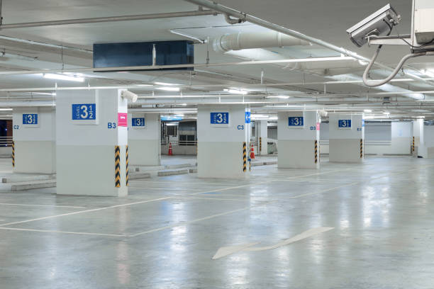 istock CCTV camera installed on the parking lot to protection security. 921808568