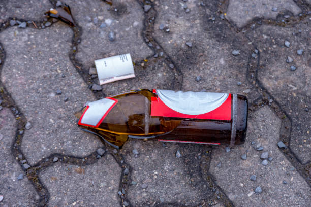 istock broken beer bottles in the middle of the footpath 921809408