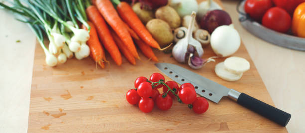 istock Pile of organic vegetables on a wooden table 921817590
