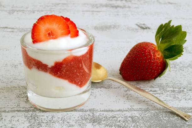 istock Natural homemade yogurt on a light background. 921822954